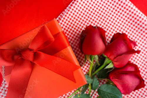 Valentines gift box with a red bow on red background Image of Va