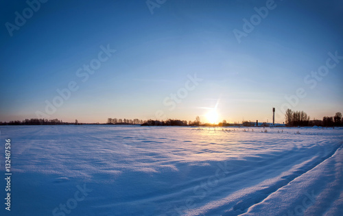 winter sunrise over the field