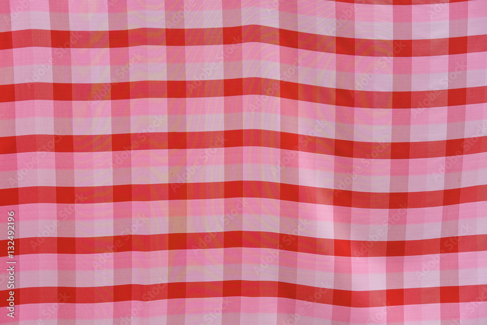 Striped loincloth fabric background with sunlight Striped loincloth fabric background with sunlight