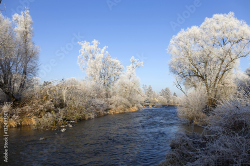 Beautiful fairytale snowy winter countryside with blue Sky in Central Bohemia, Czech Republic © Kajano