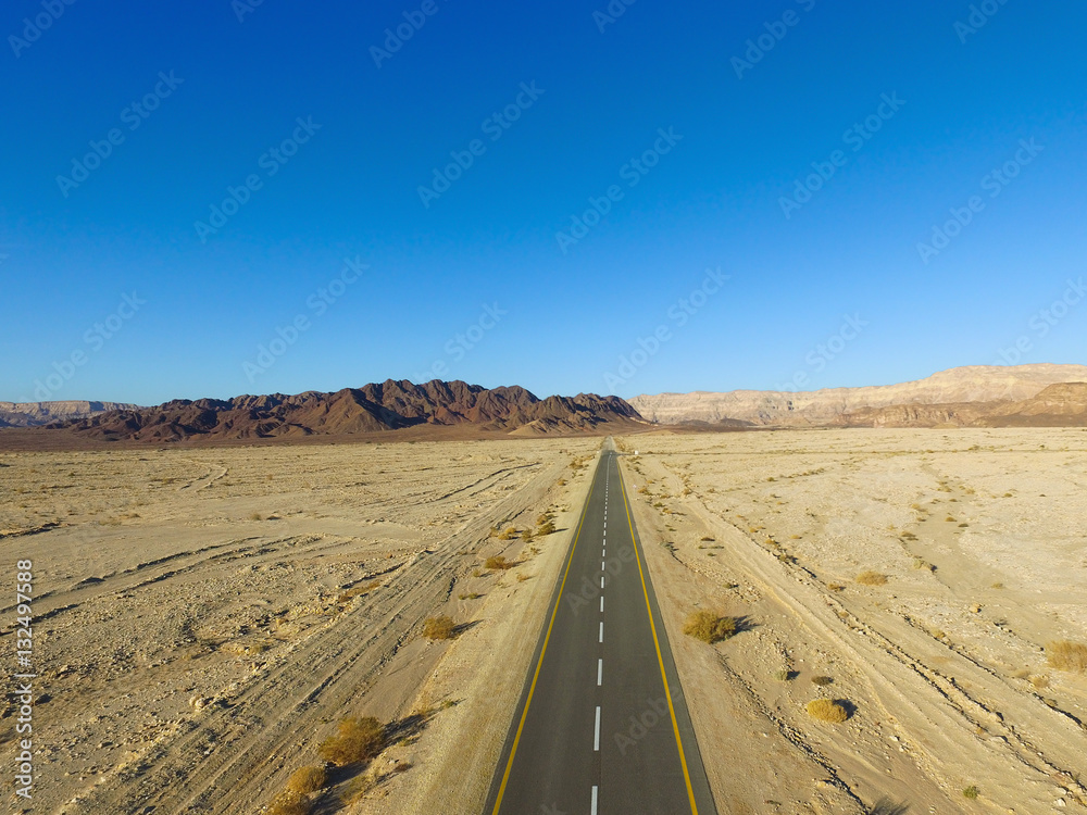 Fototapeta premium Empty desert road aerial view
