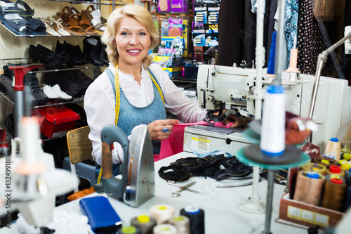 Tailor working on sewing machine