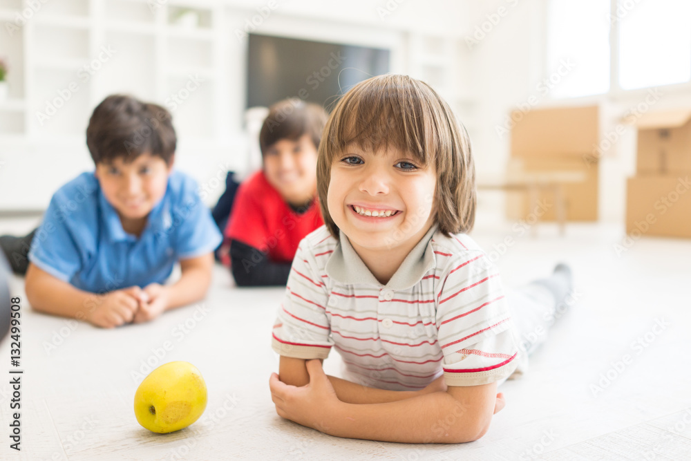 Fototapeta premium Children group on floor in house