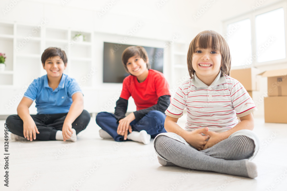 Children group on floor in house