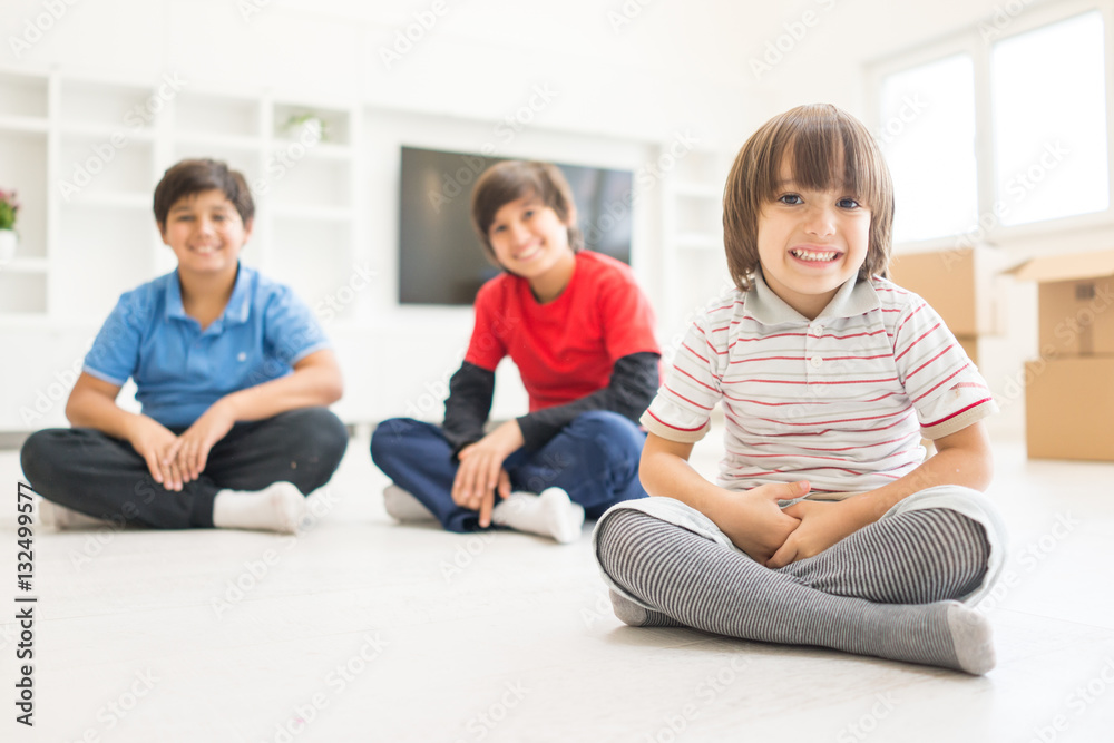 Children group on floor in house