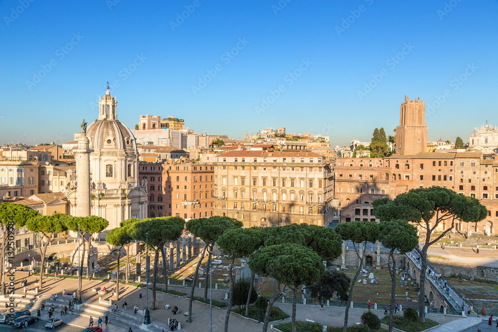 Rome, Italy. Ruins of the Forum of Trajan (112) and the Church of the Holy Name of Mary (1736 - 1738)