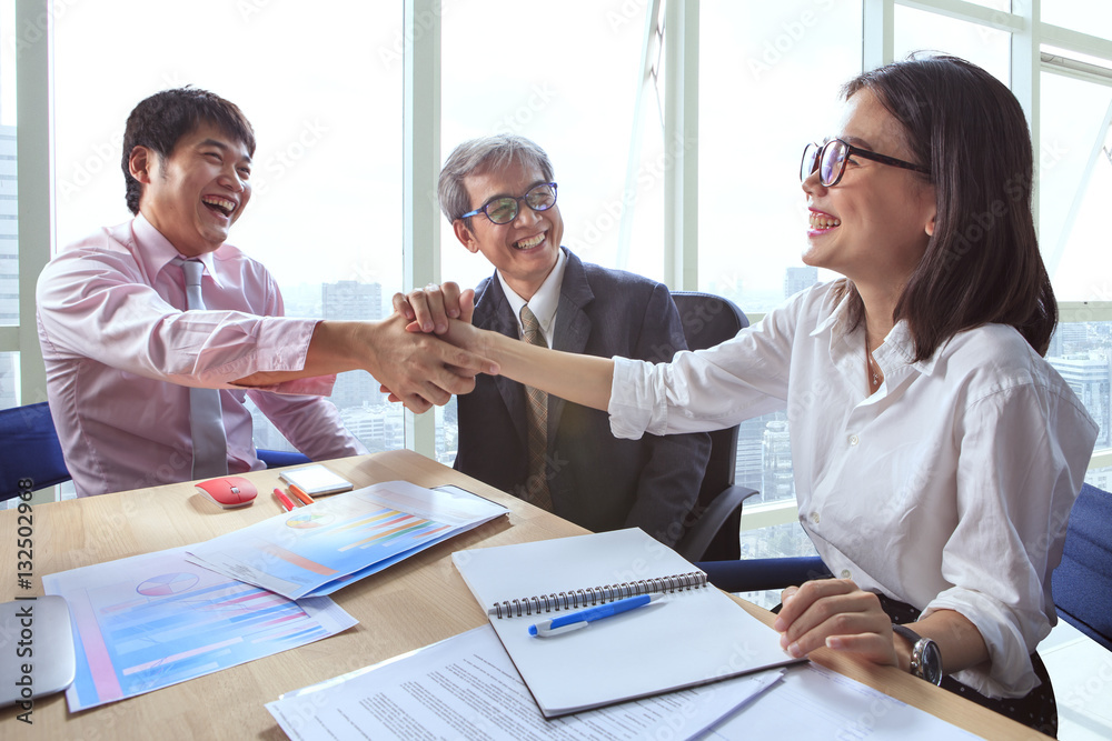 business team shaking hand and laughing happiness for successful business team shaking hand and laughing happiness for successful