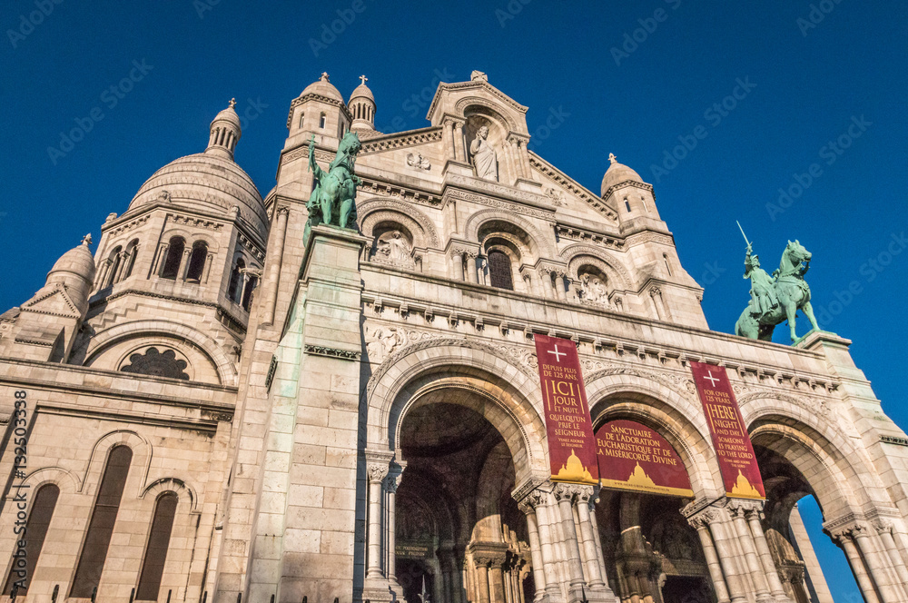 The facade of Sacre Coeur Church in Paris