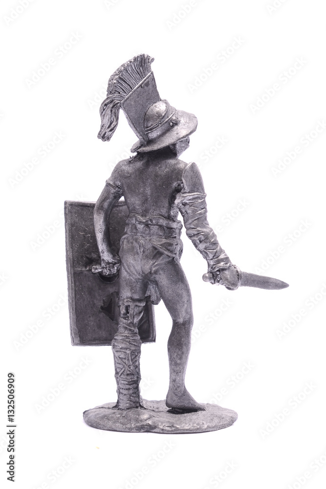 Fototapeta premium tin soldier knight with sword isolated on white