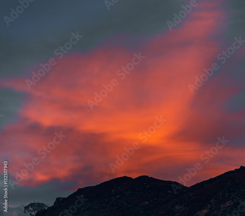 Last rays of the sun in the clouds - Gokyo region, Nepal, Himalayas photo