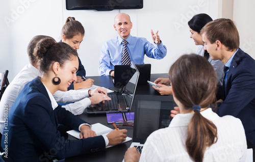 Coworkers meeting at conference room