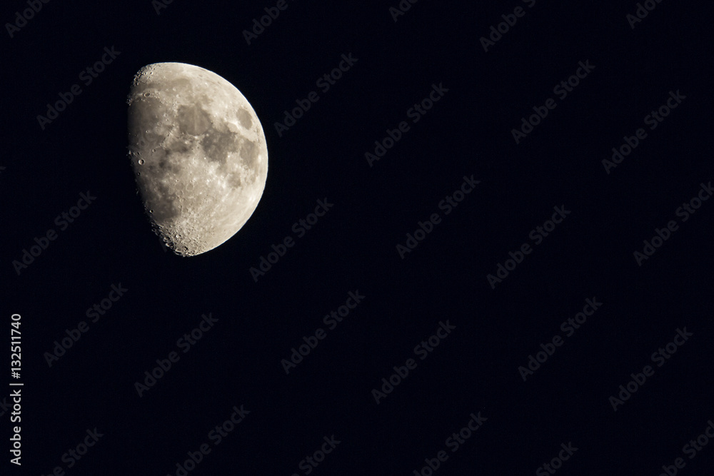 The moon in the night sky in winter The moon in the night sky in winter