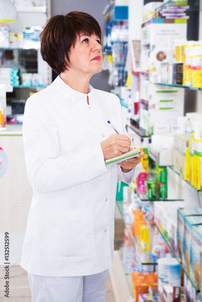 Woman pharmacist in pharmacy