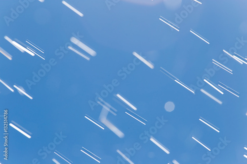 rain drops on a background of blue sky