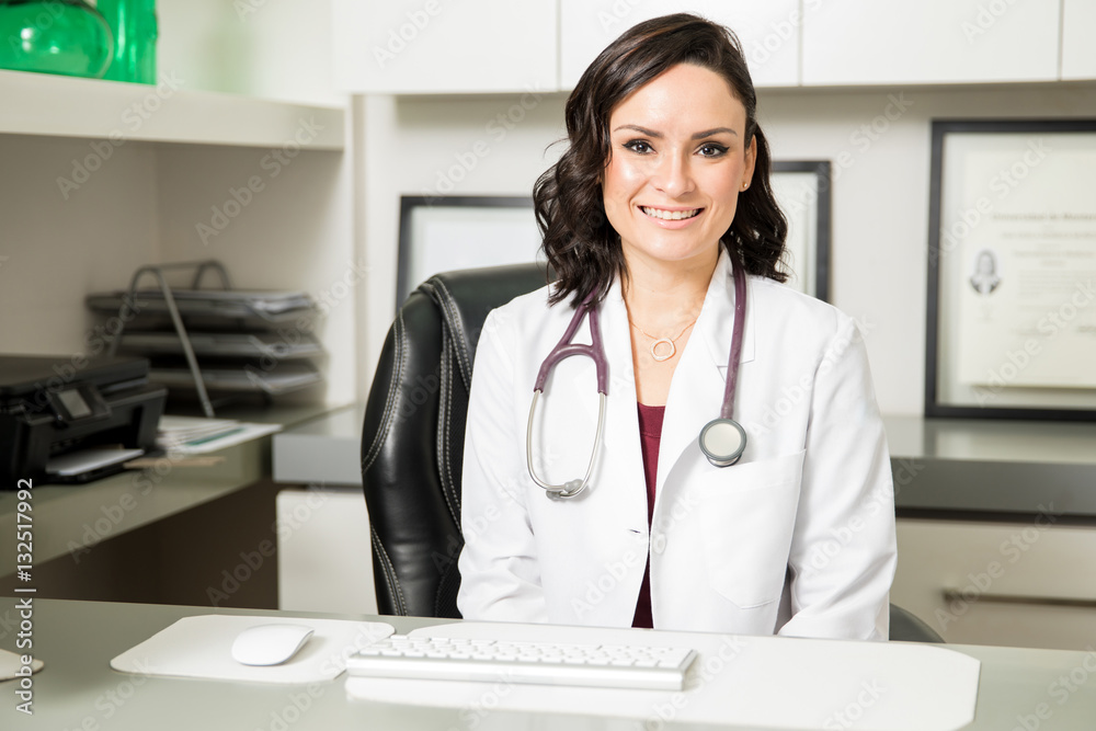 Beautiful female doctor in her office Beautiful female doctor in her office