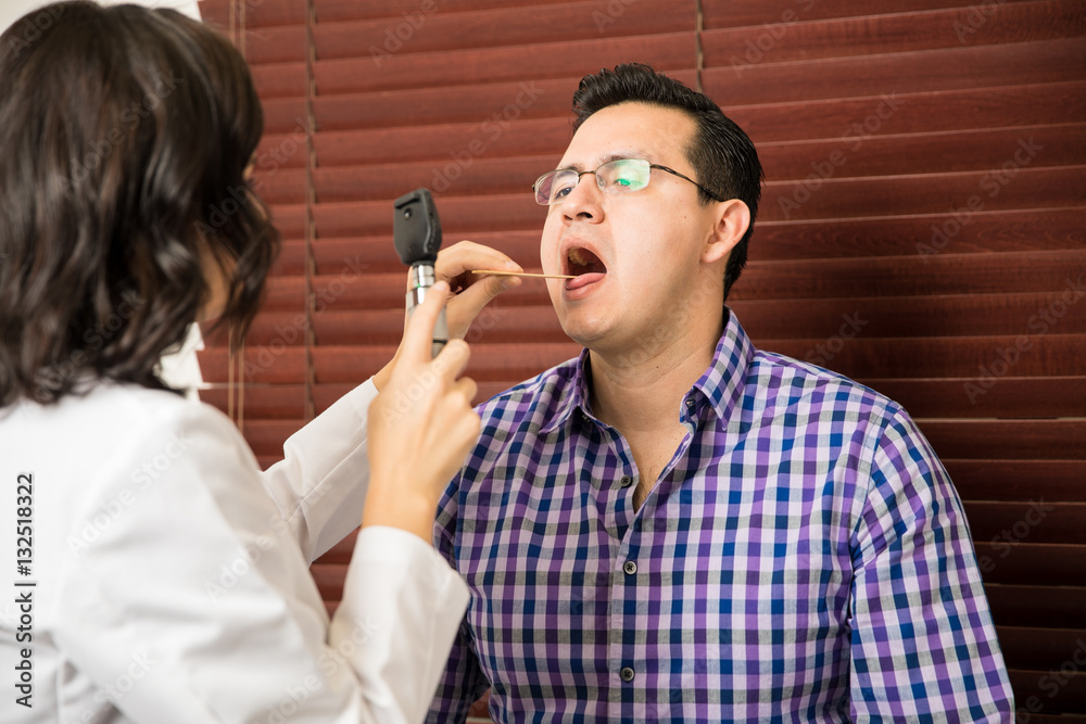 Patient opening his mouth for doctor Patient opening his mouth for doctor