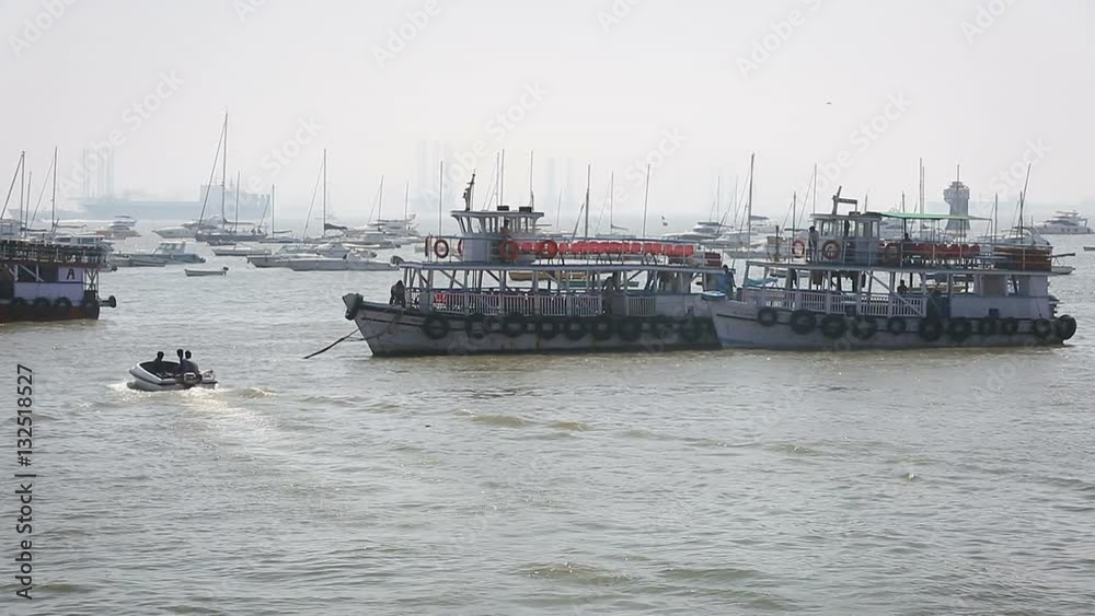 Tourist and fisher boats by the harbour Tourist and fisher boats by the harbour