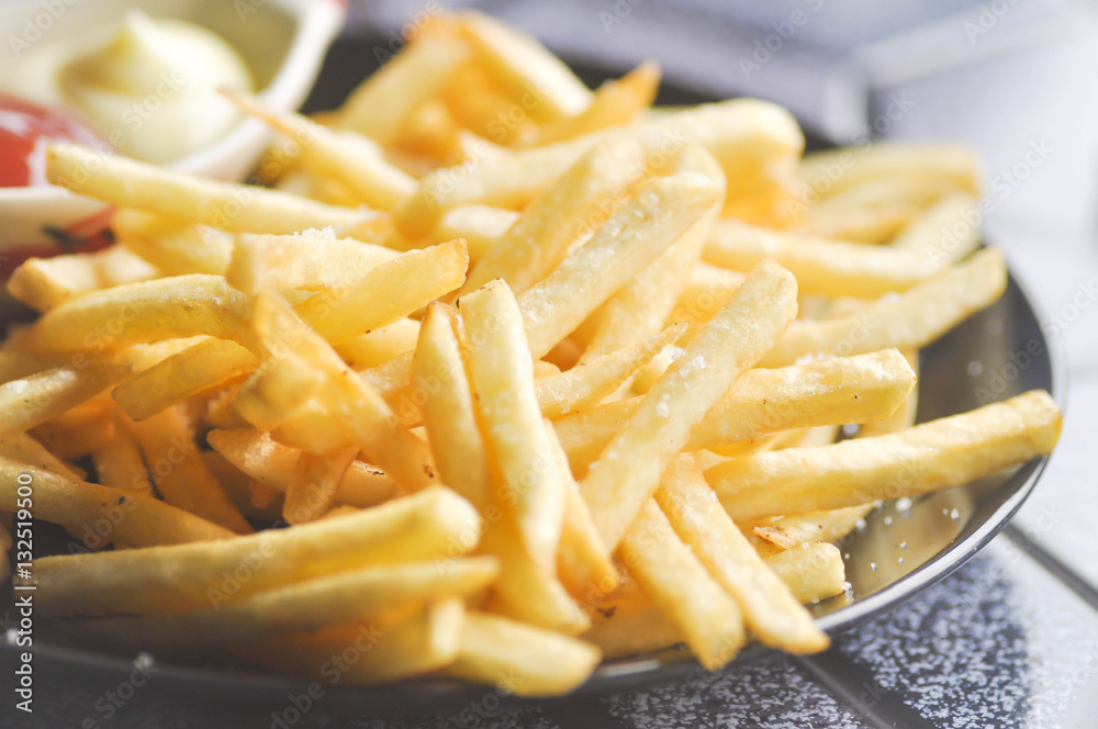 French fries with ketchup and mayonnaise French fries with ketchup and mayonnaise