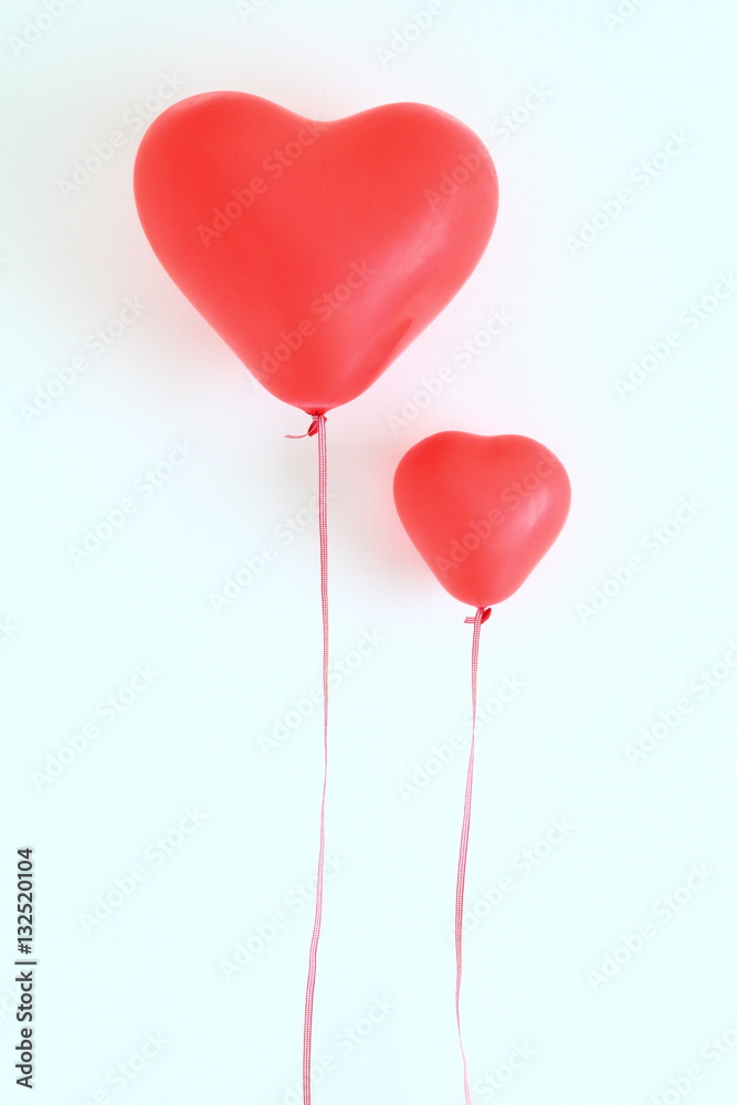 Red heart shaped balloons