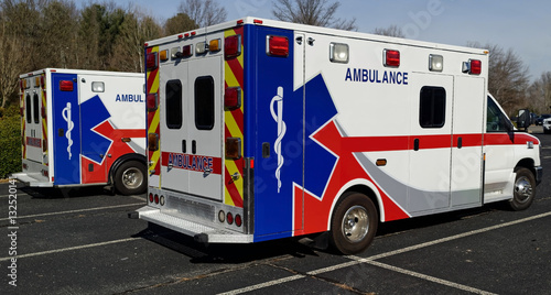 Obraz na plátně Side and rear view of two parked ambulances. Horizontal.