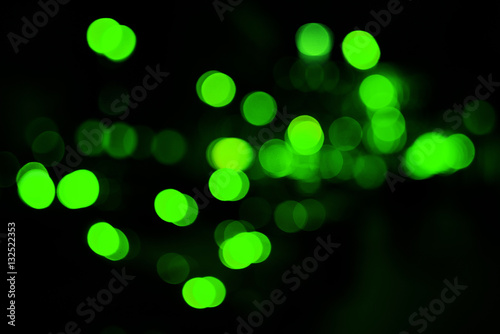 Colorful green abstract background with bokeh