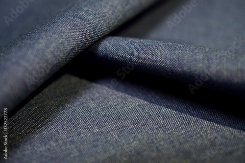 close up texture dark purple blue fabric of suit