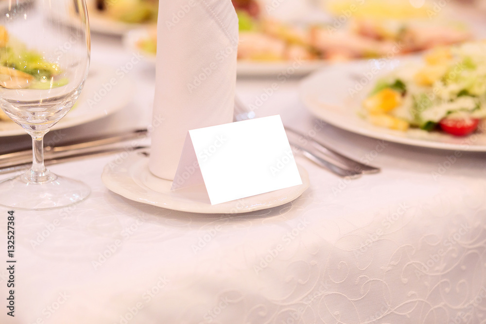 Blank event Guest Card on restaurant table Blank event Guest Card on restaurant table