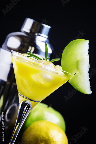 Alcoholic cocktail apple martini, with dry vermouth, syrup, lemo photo