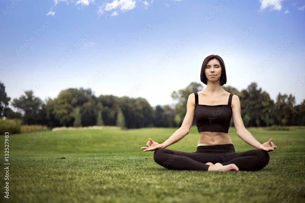 Beautiful young girl meditating Beautiful young girl meditating