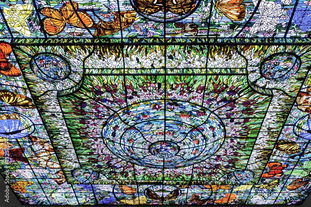 spectacular and colorful stained glass with butterflies motives in Xcaret, Quintana Roo, Mexico.