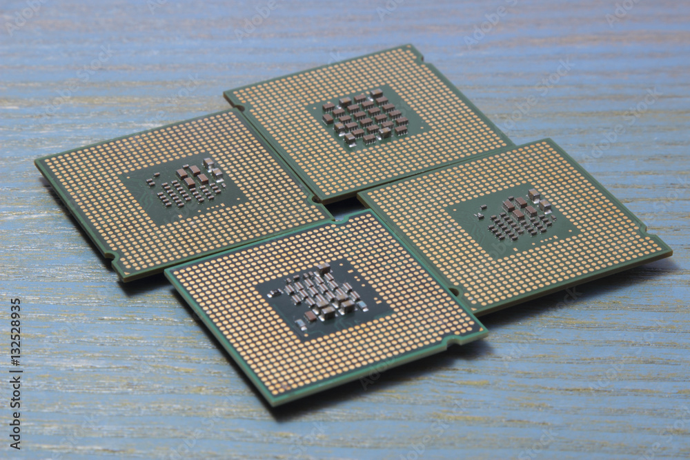 computer processor on a wooden background computer processor on a wooden background