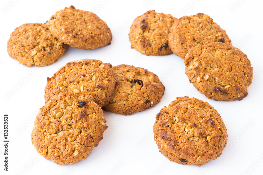 Round cookies with grain and raisins additives on white backgro Round cookies with grain and raisins additives on white backgro