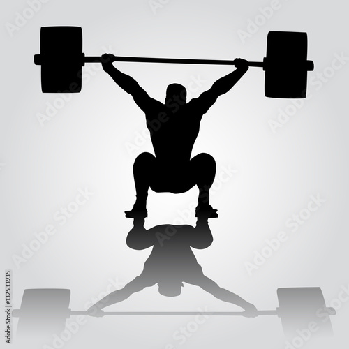  Weightlifter is sitting with barbell. Snatch. silhouette of athlete doing snatch exercise. weightlifting.