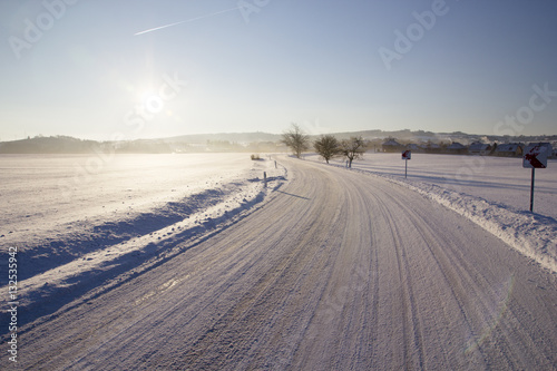 Empty road with snow coverage