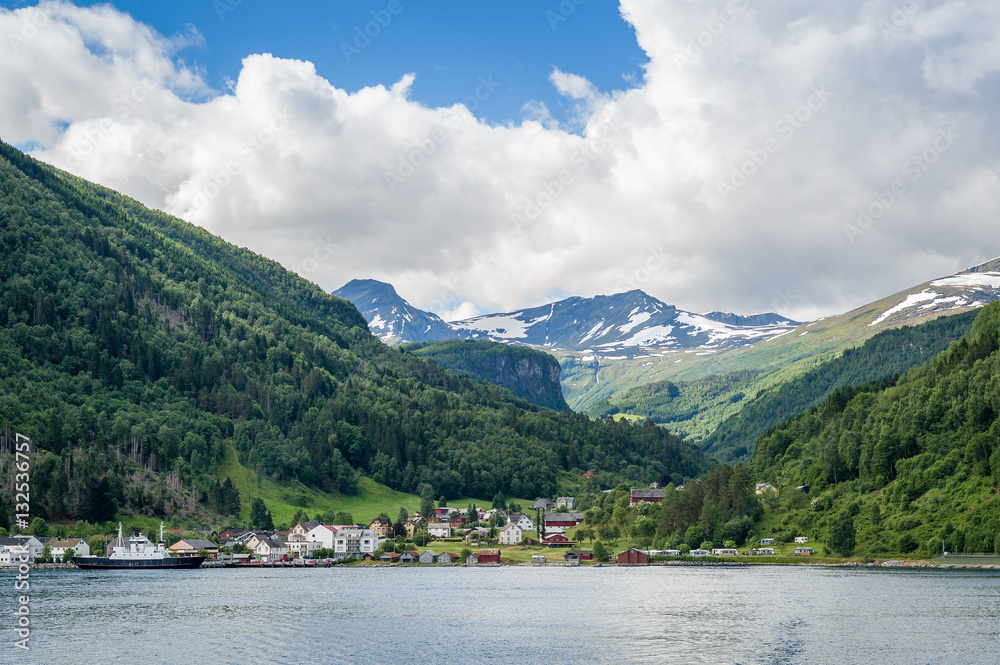 Small norwegian town on the fjord's shore.