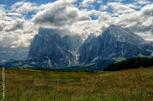 View of the Sassolungo (Langkofel) and Sassopiatto Group of the Italian Dolomites from Alpe di Siusi in Val Gardena.