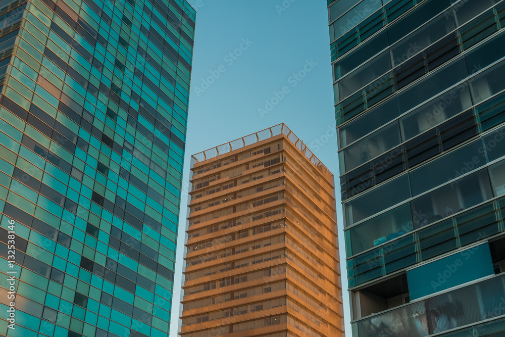 Buildings with early morning sunlight on sides