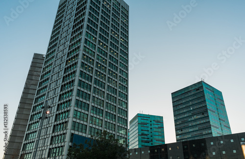 Twilight scene of tall buildings in city