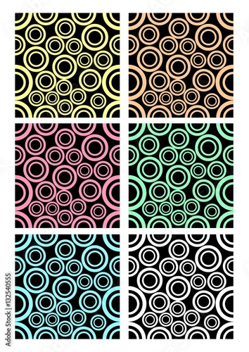 Set of classic rounded patterns on black background. Different color variants - white, purple, blue, green, yellow, dark red. Template for  textile or paper print, contrasting colors