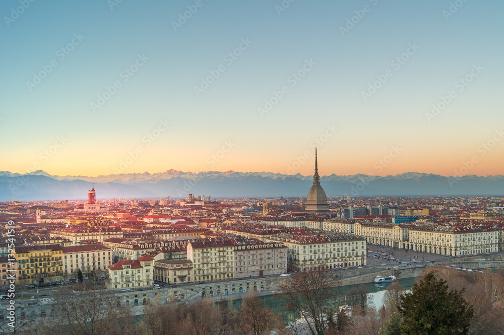 panorama of the city of turin from above at sunset with mole Antonelliana