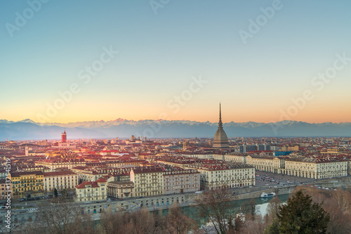 panorama of the city of turin from above at sunset with mole Antonelliana