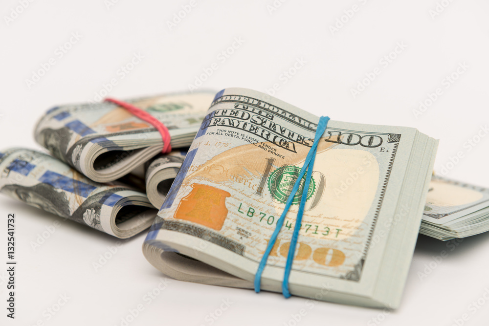 Packs of hundred dollar bills Packs of hundred dollar bills