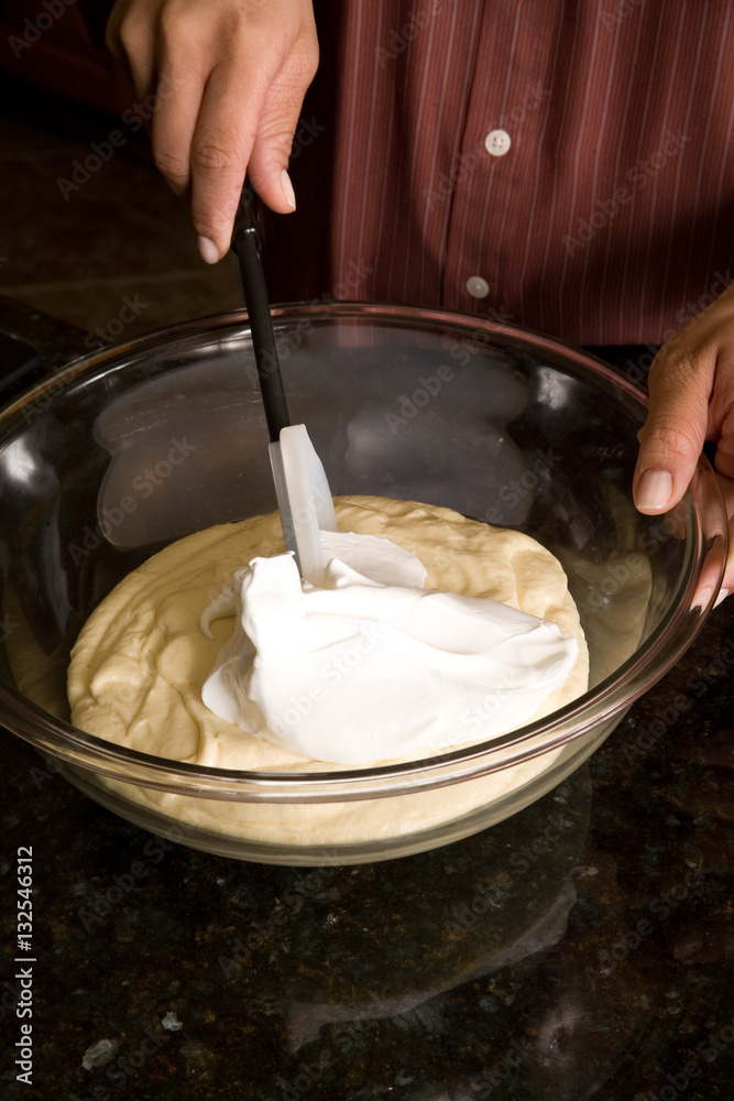 folding cream into mixture folding cream into mixture