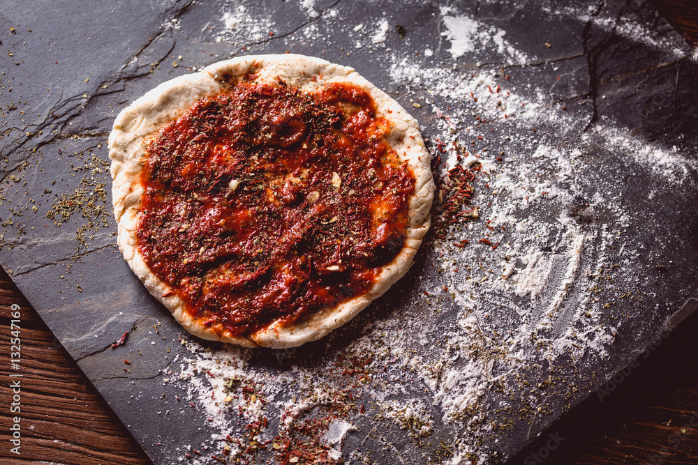 Homemade dough, preparing natural pizza on wooden table