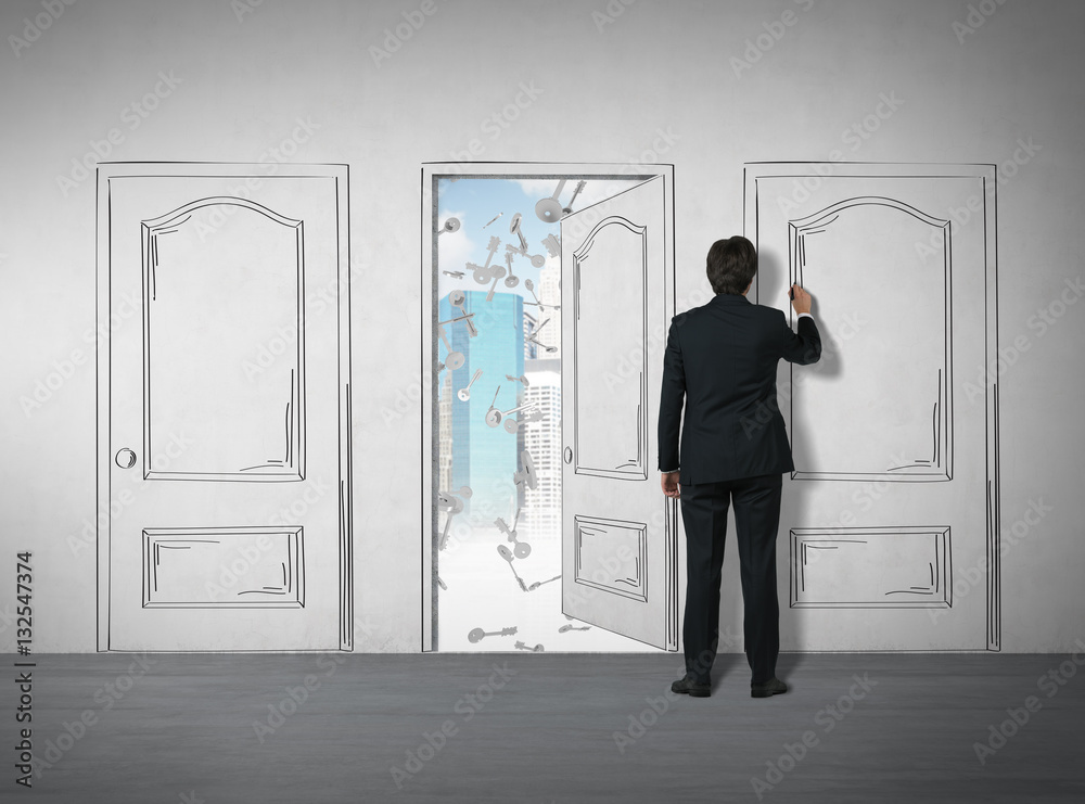 Fototapeta premium Man drawing a door with a marker