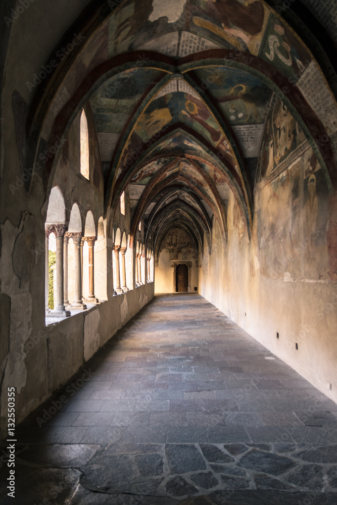 Cathedral cloister with the frescoed wall.