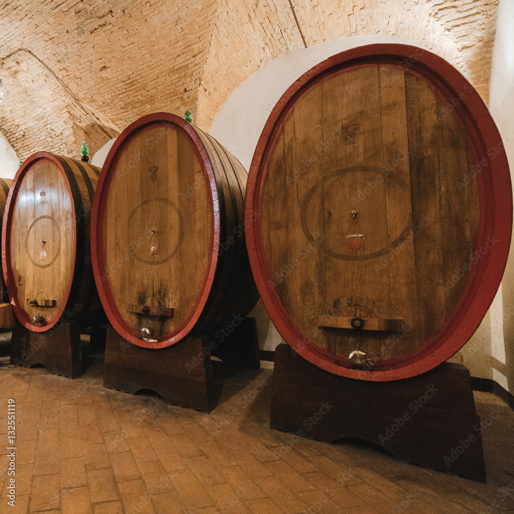 Oak barrels in an old wine cellar.
