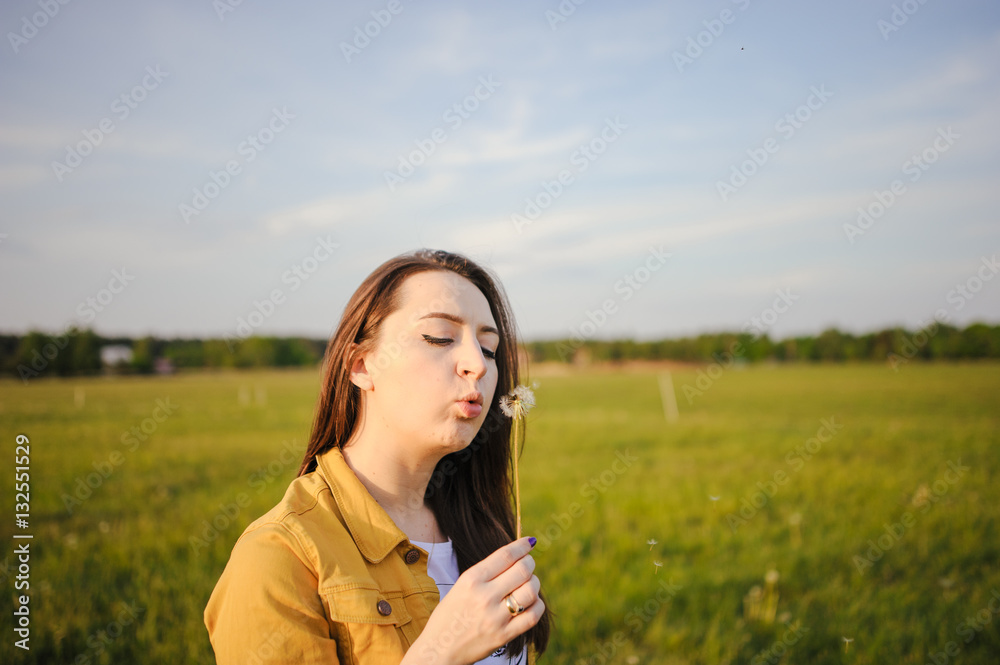 Happy young girl enjoying the beauty of sunny spring day Happy young girl enjoying the beauty of sunny spring day