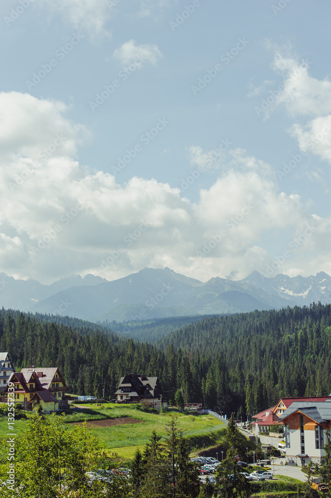 Guest house in the traditional mountain style and mountain landscape.