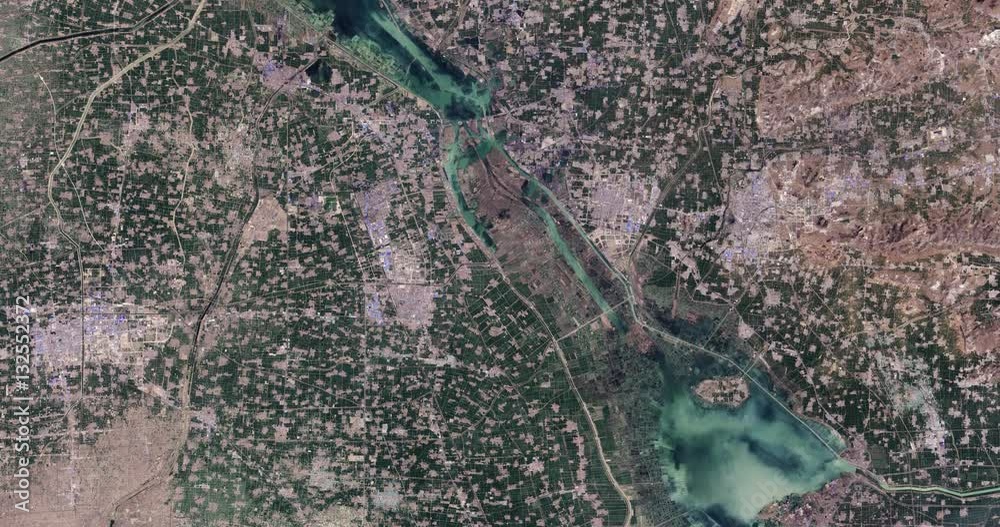 High-altitude overflight aerial of Nansi Lake and adjacent land, China’s Shandong province. Clip loops and is reversible. Elements of this image furnished by USGS/NASA Landsat High-altitude overflight aerial of Nansi Lake and adjacent land, China’s Shandong province. Clip loops and is reversible. Elements of this image furnished by USGS/NASA Landsat